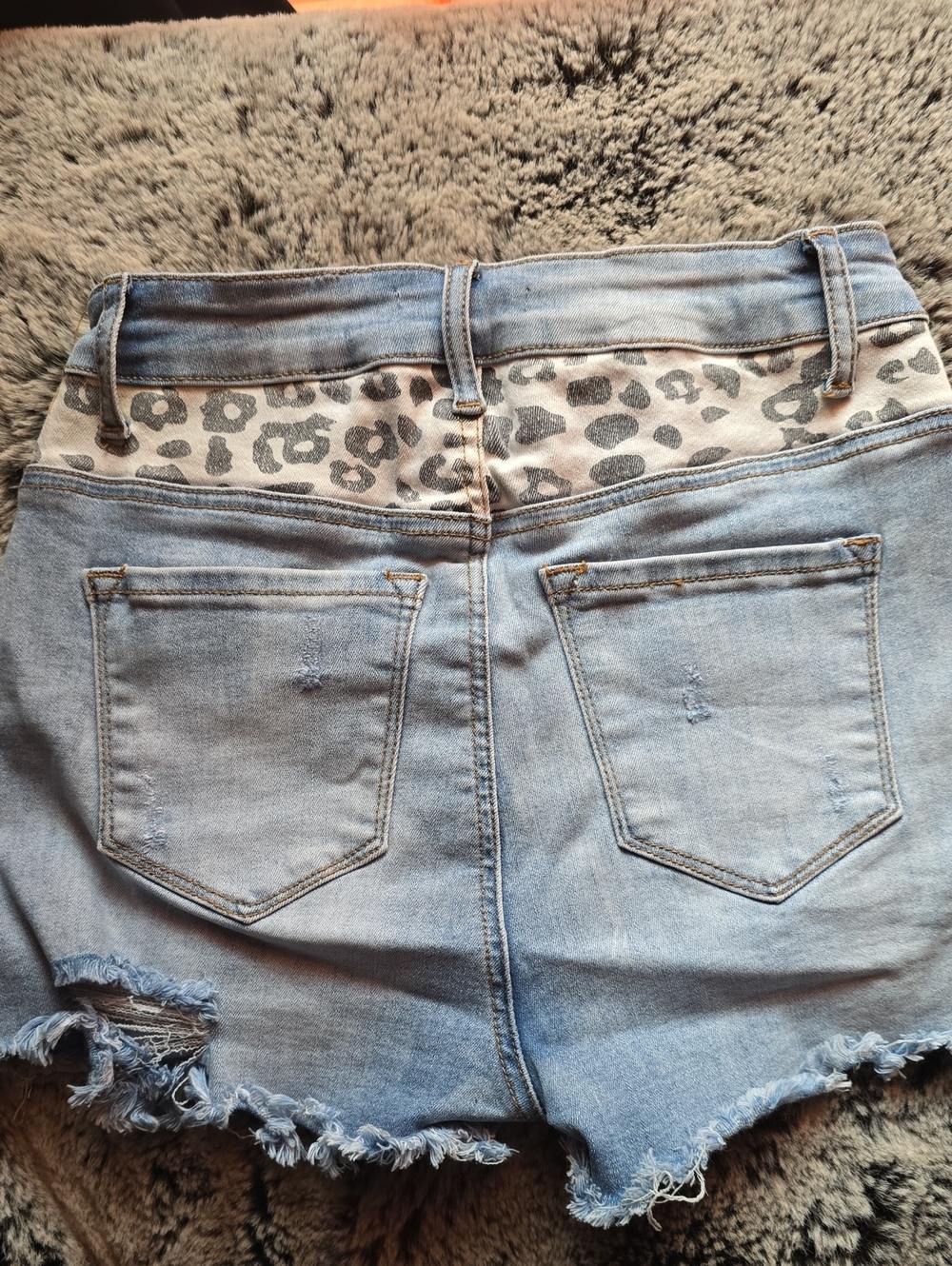 Distressed Denim Shorts With Leopard Print Back